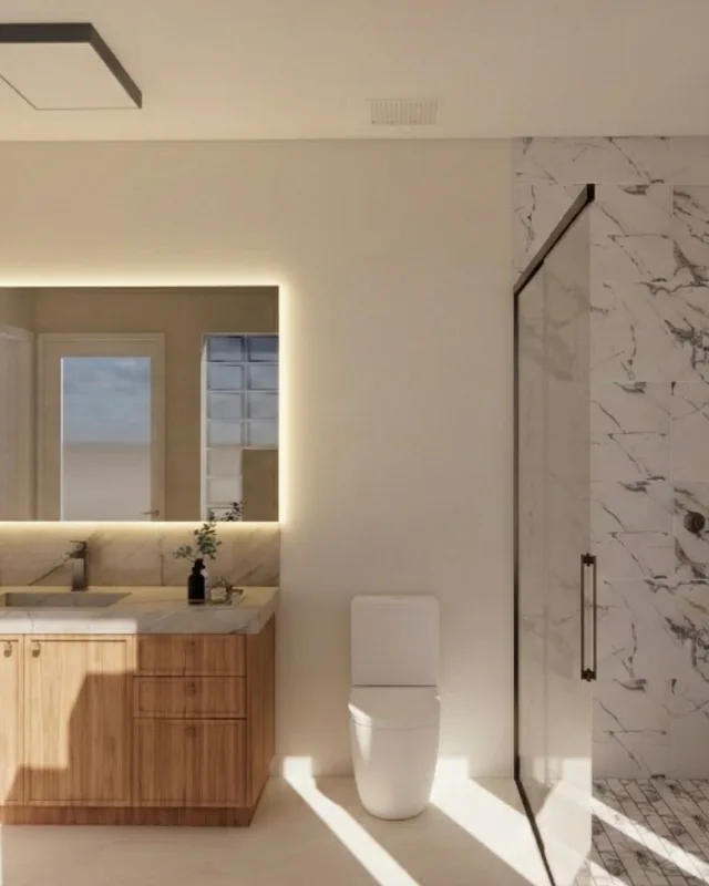 4D render of a bathroom with a wood vanity, a backlit mirror and a marble-look walk-in shower