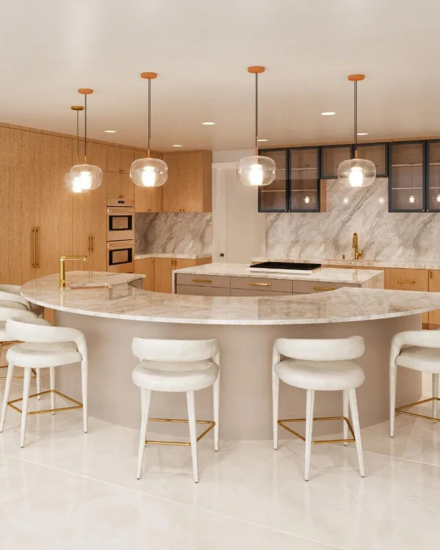 4D render of a kitchen with a curved stone island, white stools and light wood cabinets