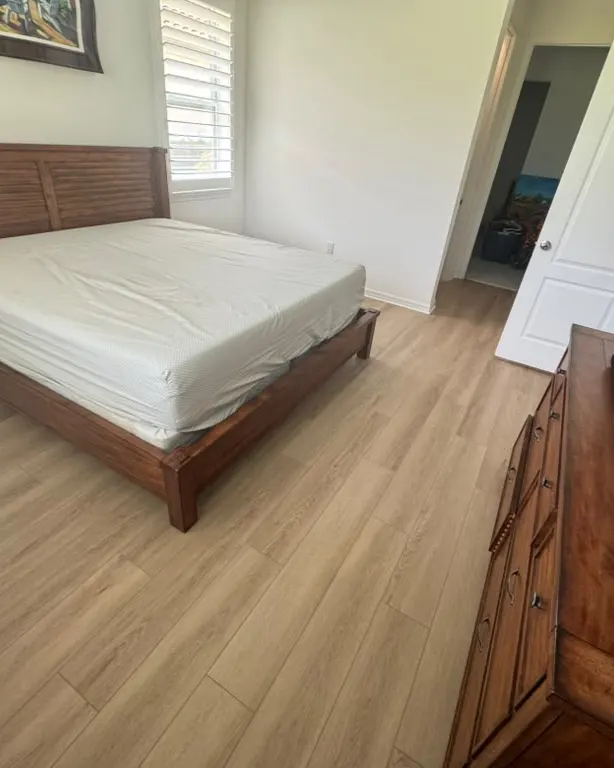 Finished: Light oak-look floors in bedrooms & hallways